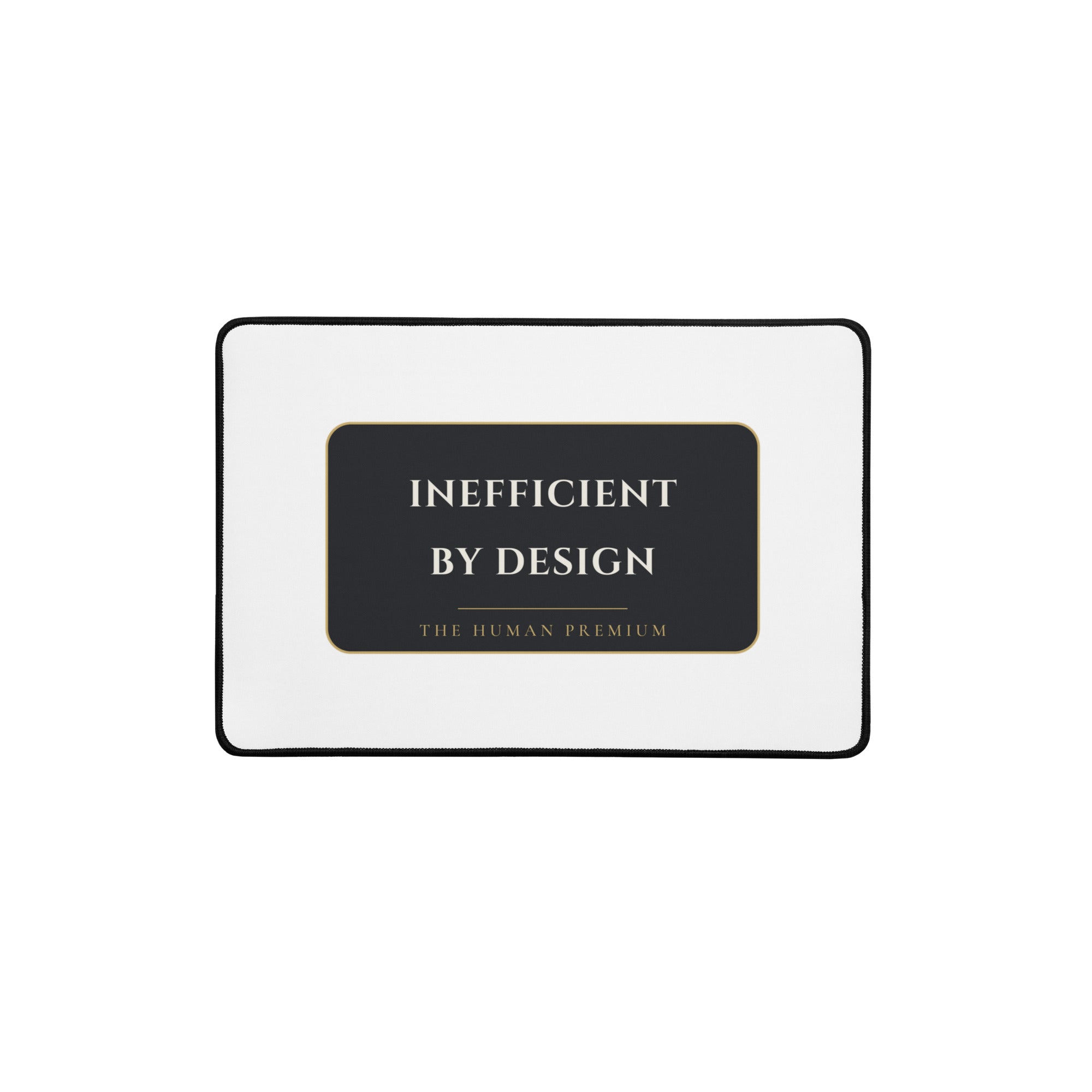 The Human Premium anti-slip desk mat in black, 12 by 18 inches