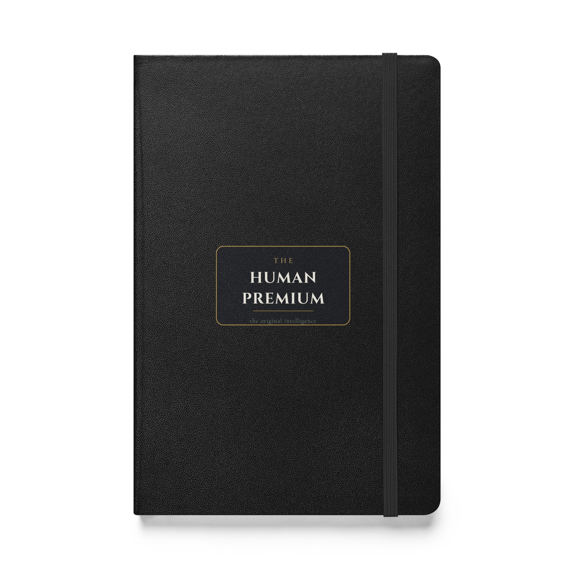 The Human Premium black hardcover lined notebook, front cover with wordmark
